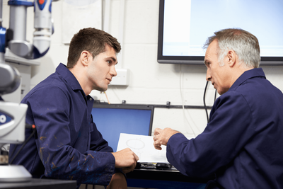 apprenticeships man teaching student