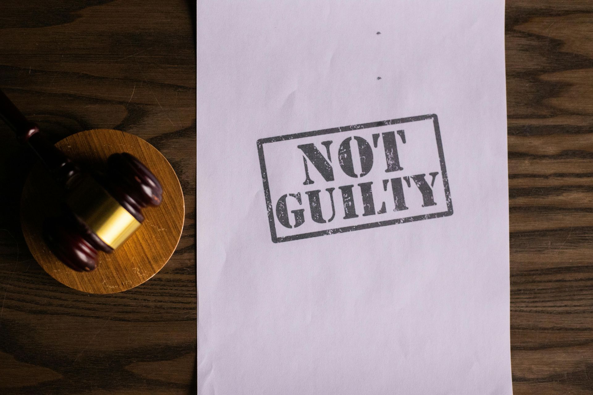 A gavel and a paper stamped 
