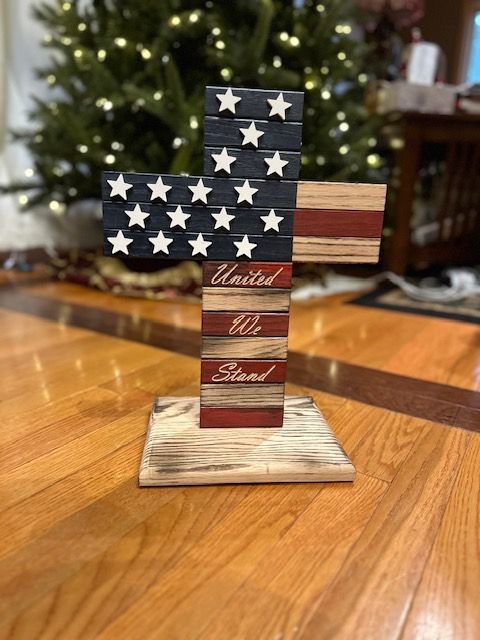 Wooden cross with American flag design and 