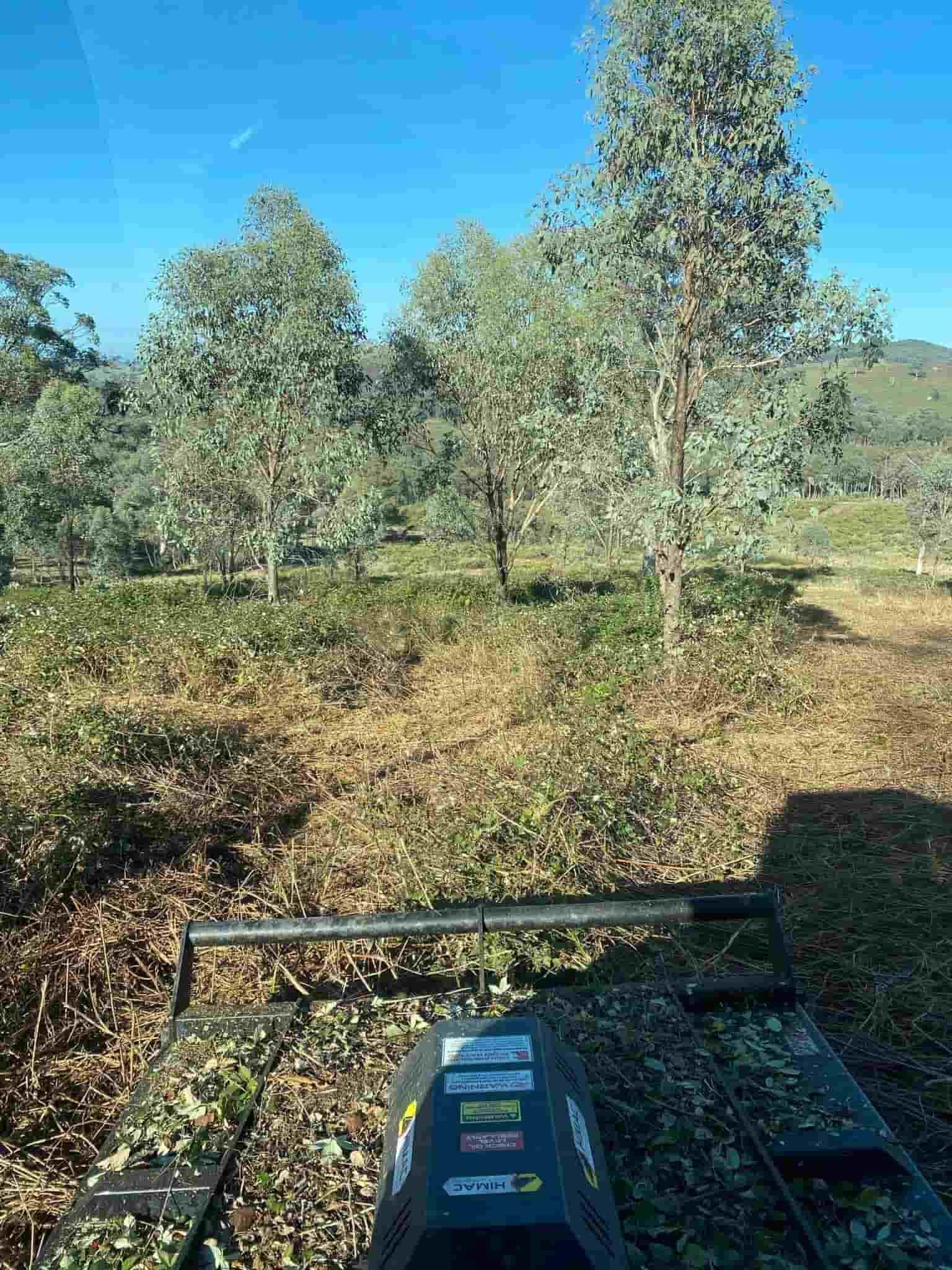 A Tractor Mulching The Vegetation — St Elmo Contracting in Peelwood, NSW