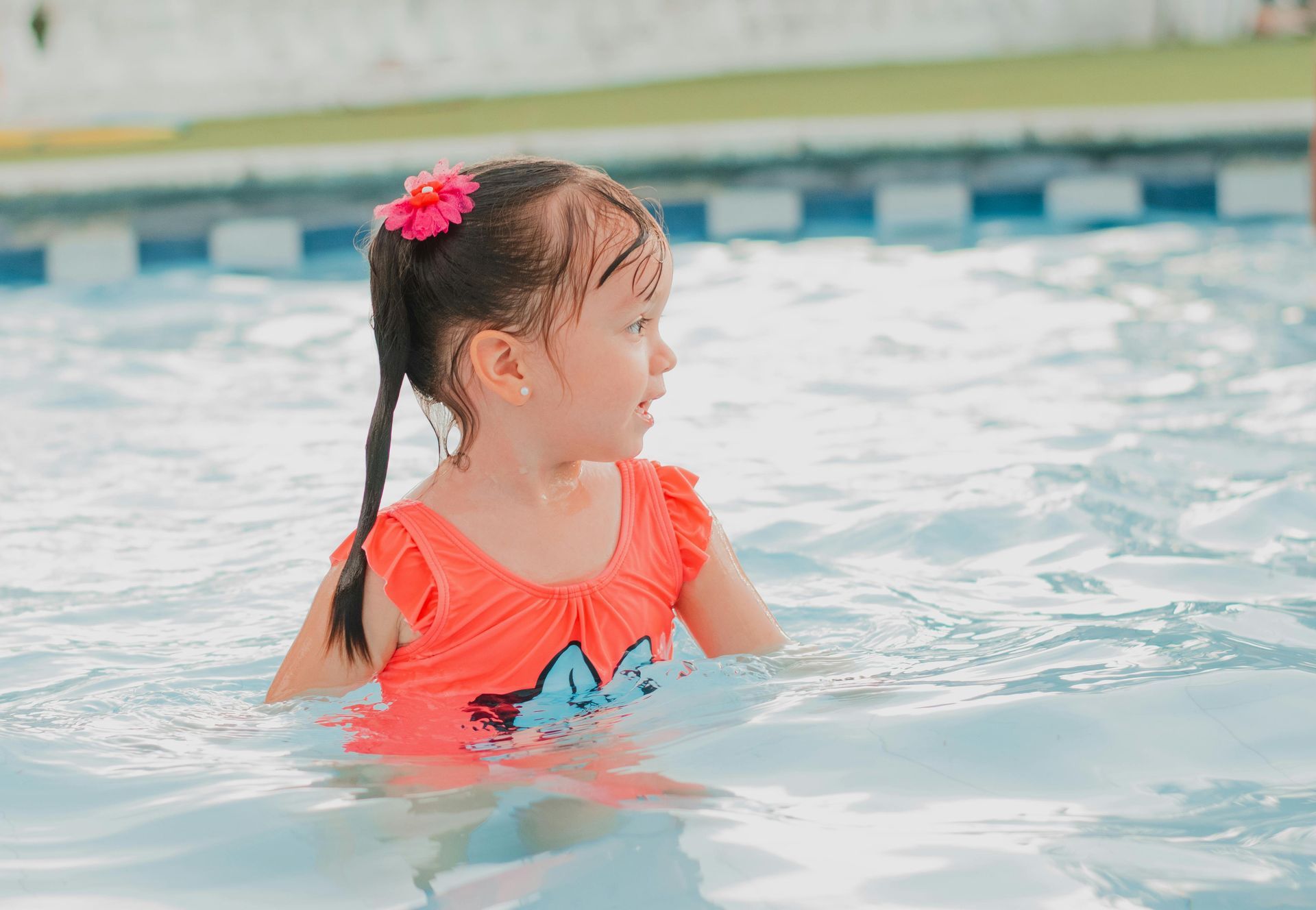 Girl wading in swimming pool Hampton Roads VA