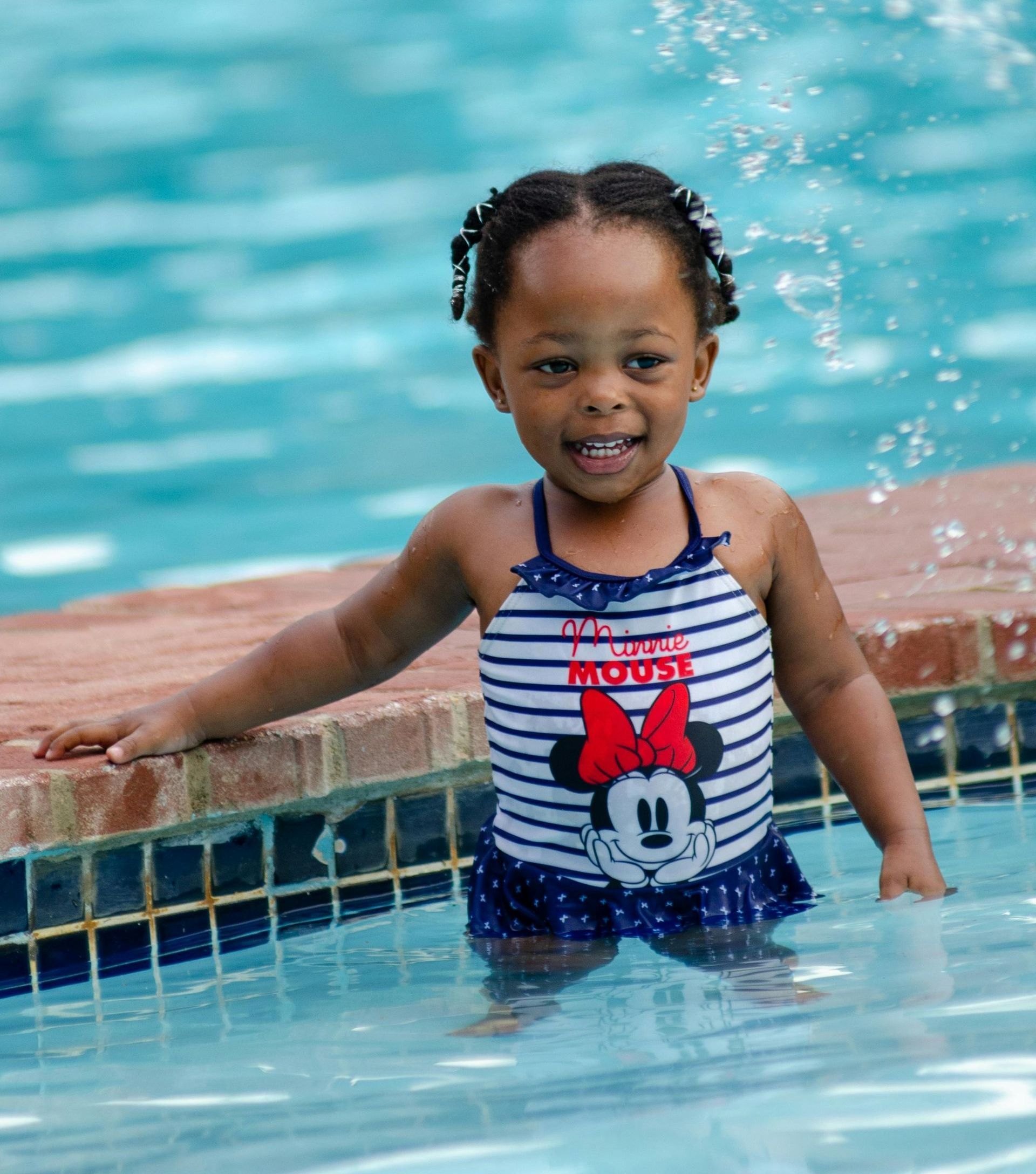 Smiling girl in swimming pool Hampton Roads VA