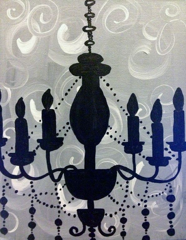 A silhouette of a chandelier with candles hanging from it