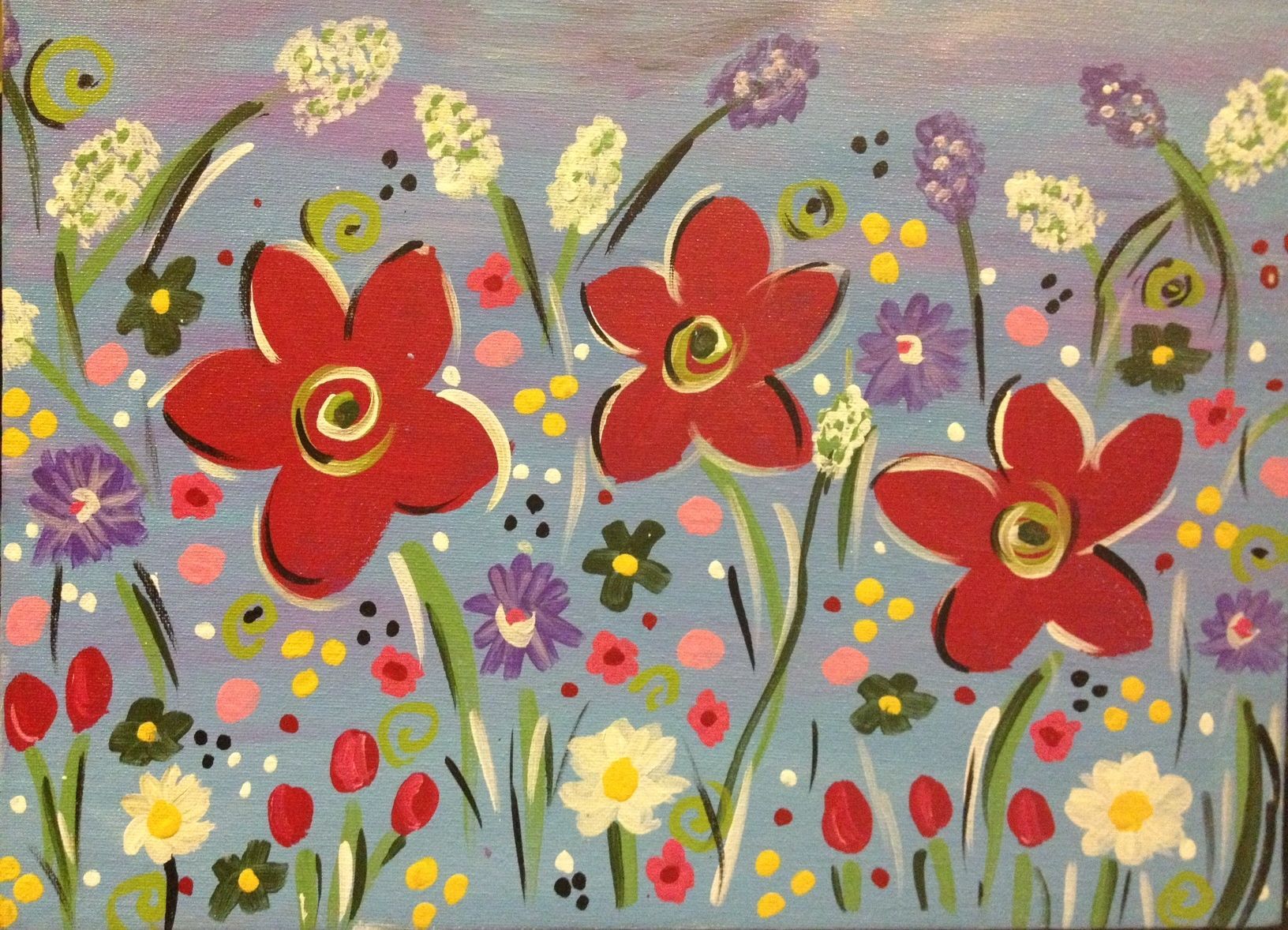 A painting of red flowers in a field