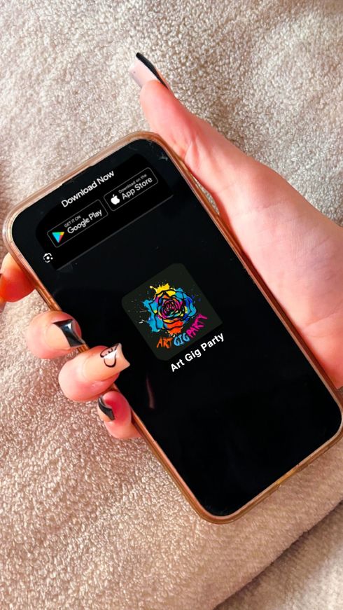 A person is holding a cell phone in their hand.