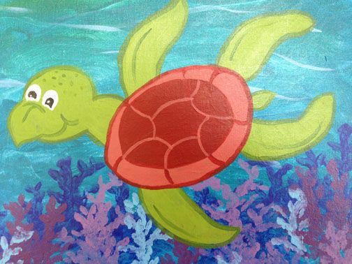 A turtle with a red shell is swimming in the ocean