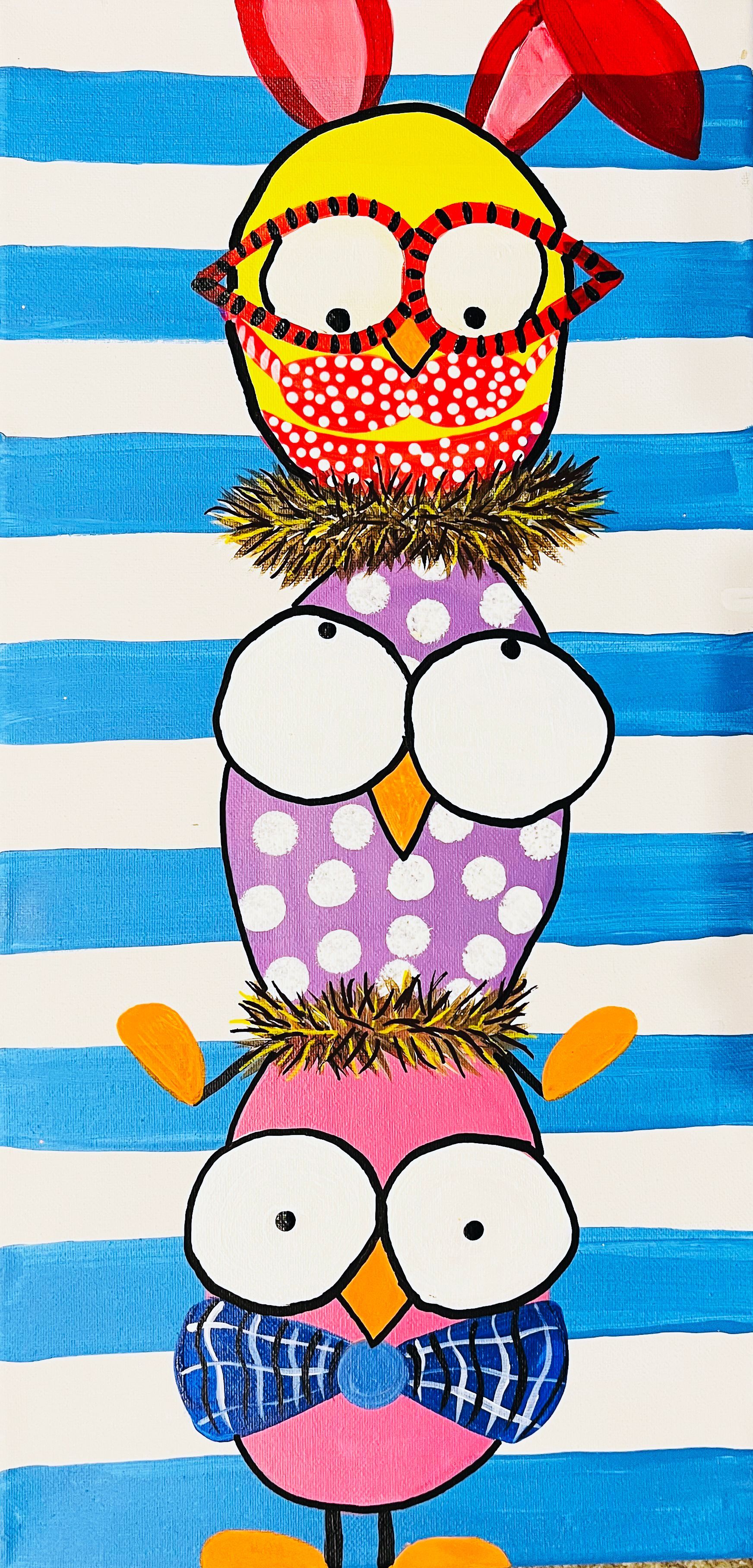 Three cartoon birds are stacked on top of each other on a blue and white striped background.