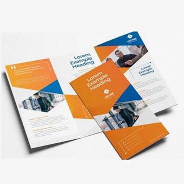 a brochure with a man shaking hands on it is sitting on a table .