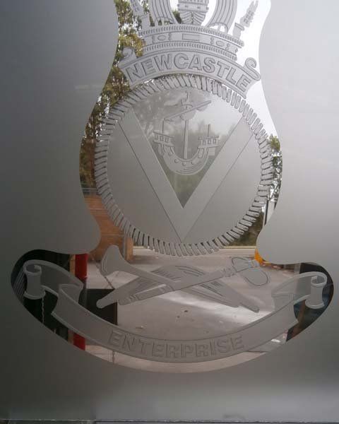 newcastle welcoming sign in glass