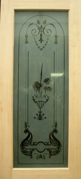 tall frosted glass window with decorations