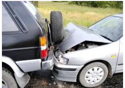 A black suv and a silver car are involved in a car accident.
