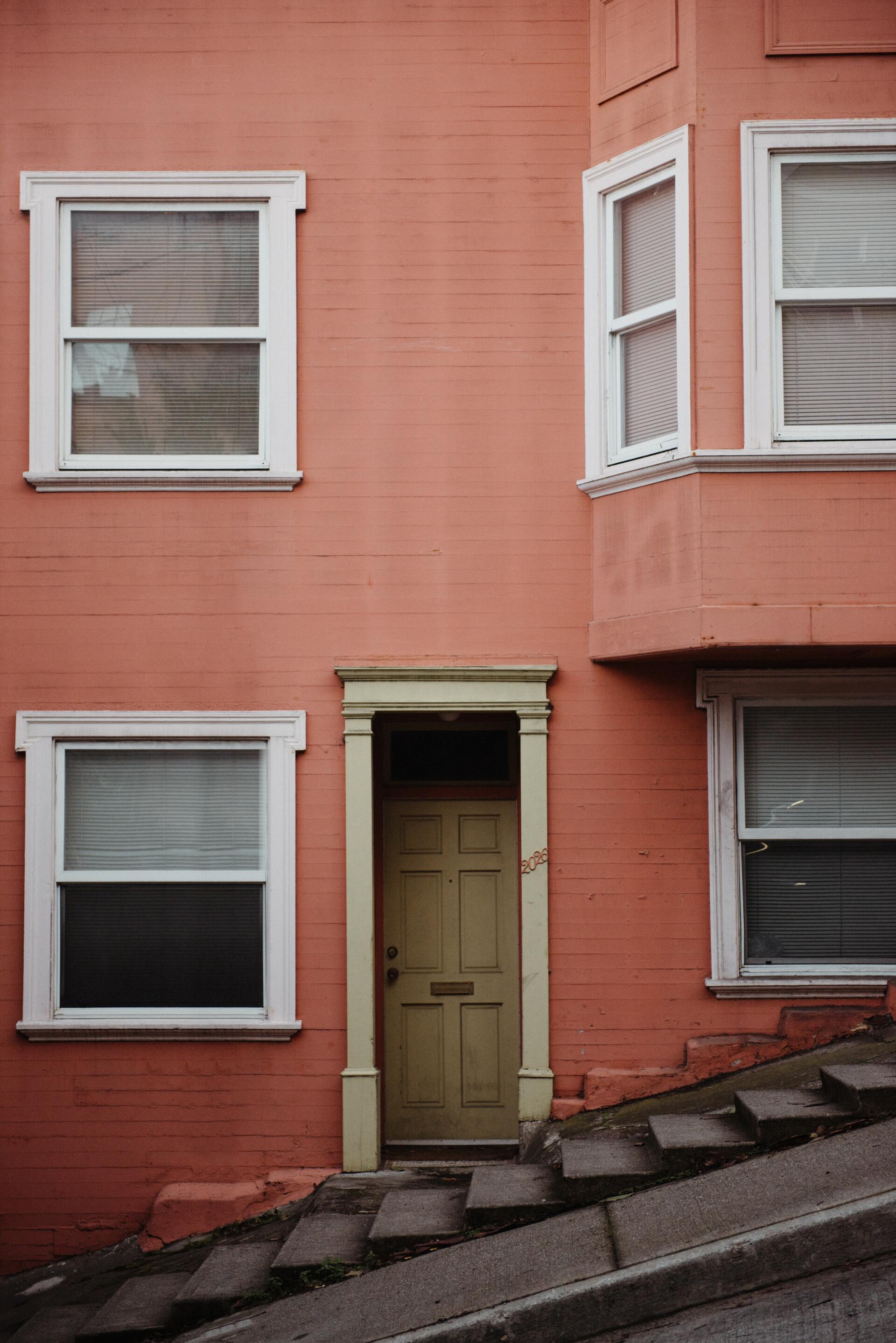 residential low-rise building with orange exterior