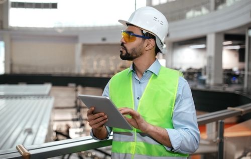 Male engineer on tablet