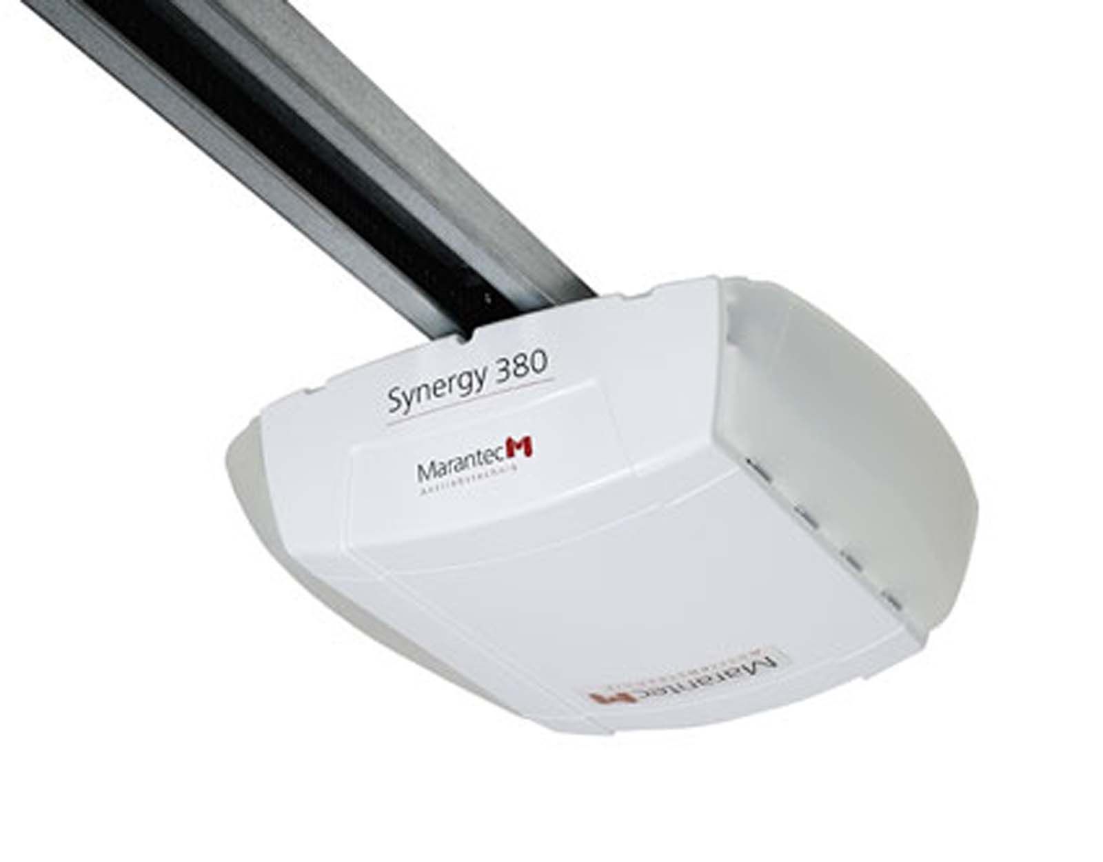 A white garage door opener that says synergy 360 on it