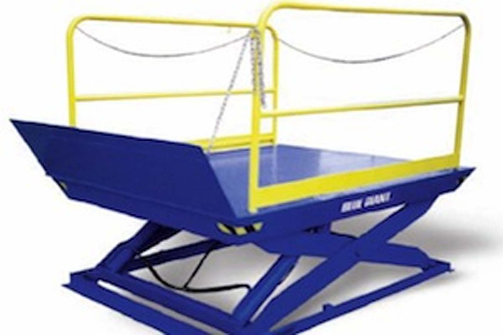 A blue scissor lift with a yellow railing