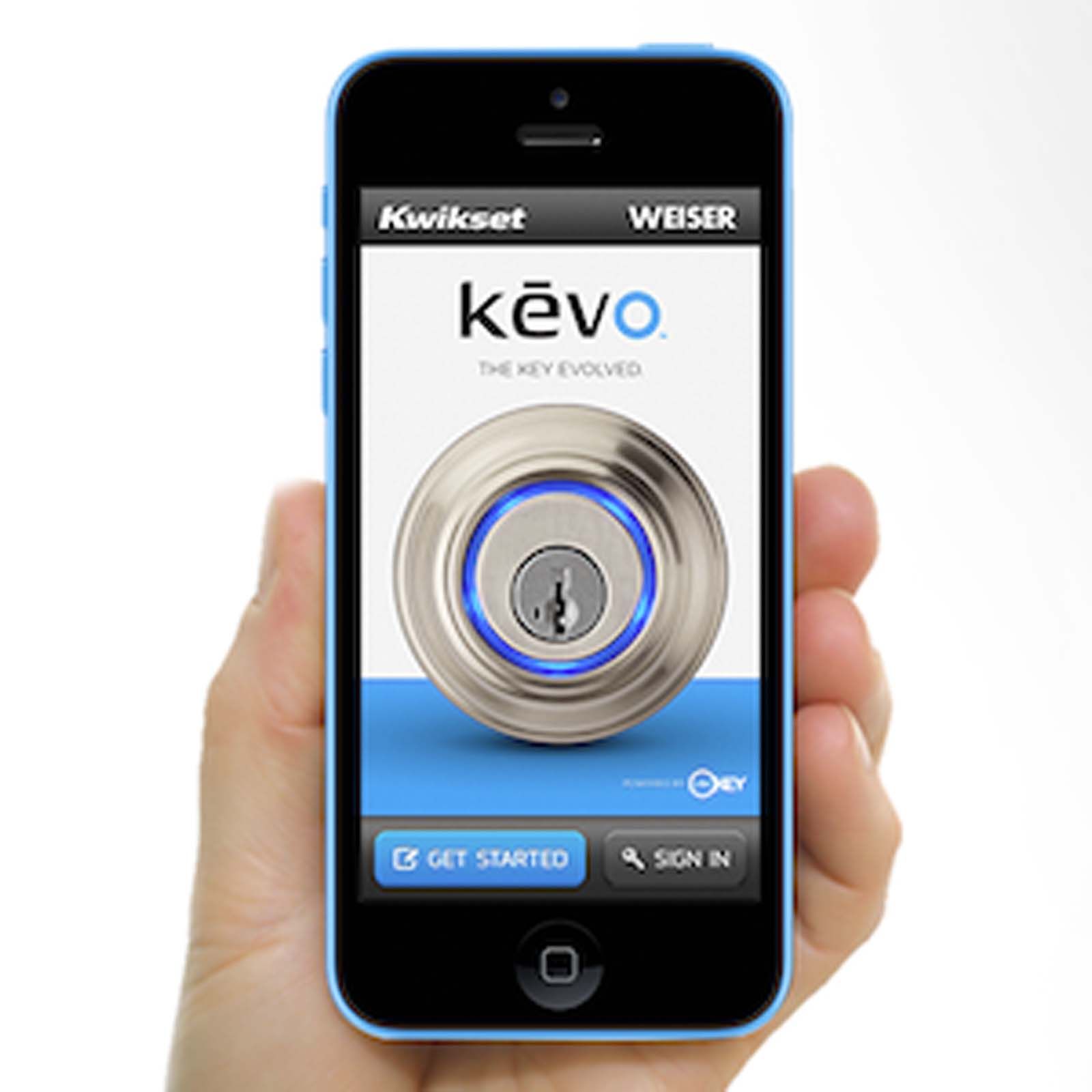 A person is holding a cell phone that says kwikset on it