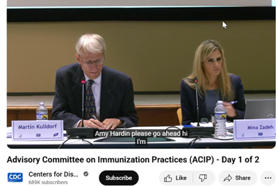 Two people at a table, at a CDC meeting. A man and a woman. Text includes