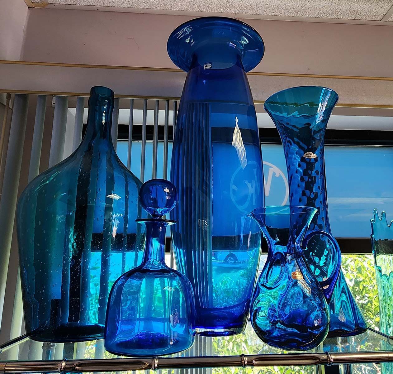 Blenko blue bottles and vases