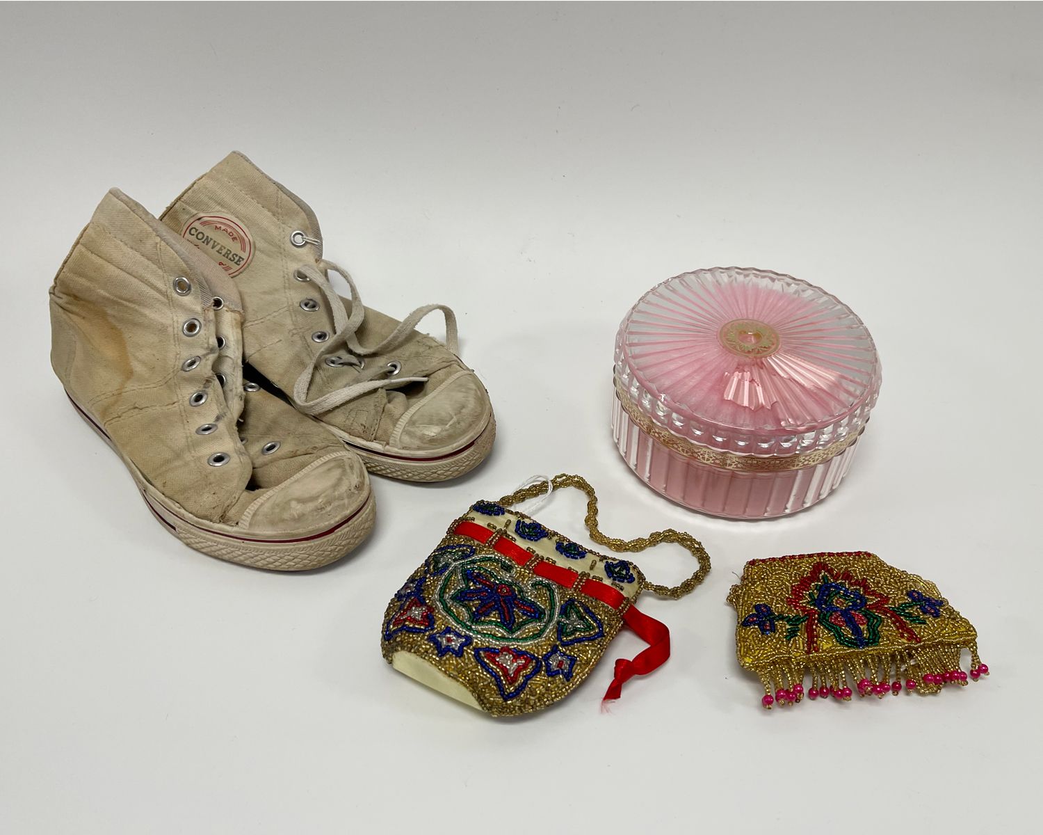 Vintage powder puff, beaded purses and sneakers