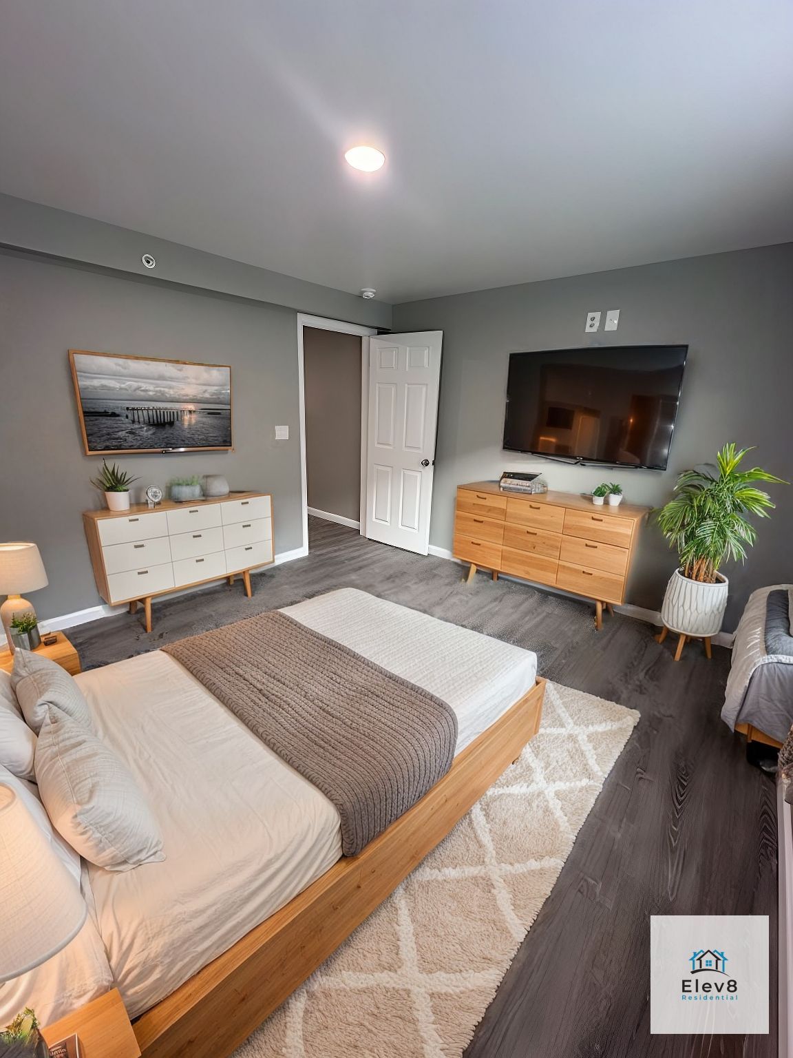 Virtual staging of a bedroom showing a medium size bedroom - alternate angle