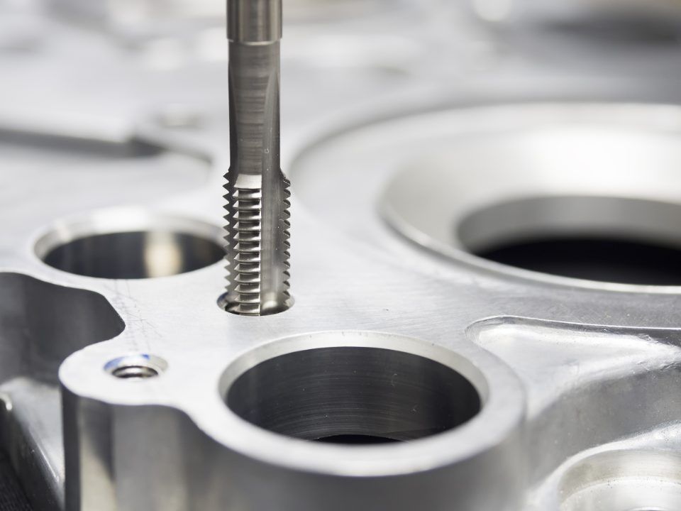 turner in action on metal material