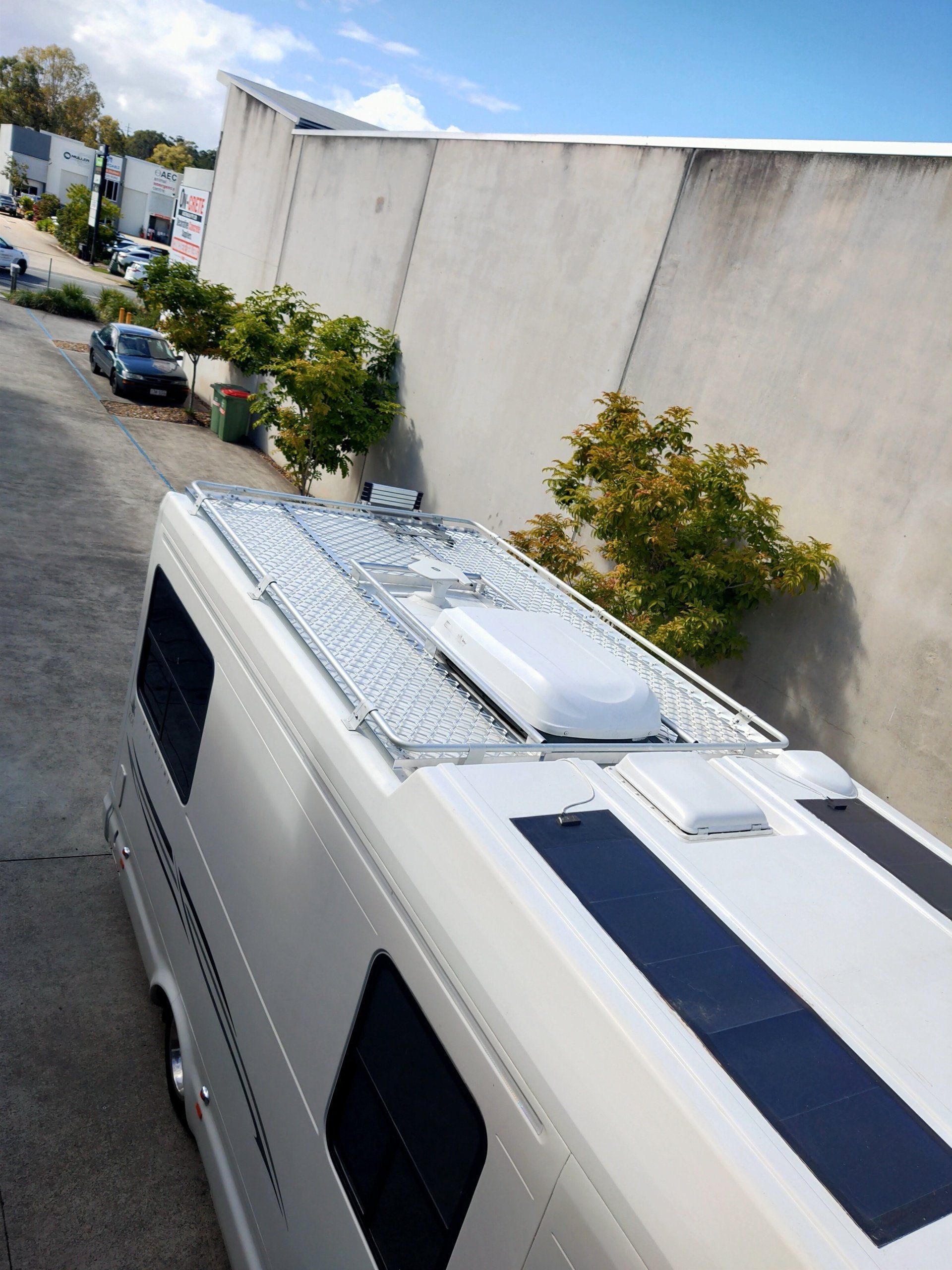 Silver Rv Roof With Solar Panels and Vents— Sheetmetal Improvements & Design in Burleigh Heads, QLD