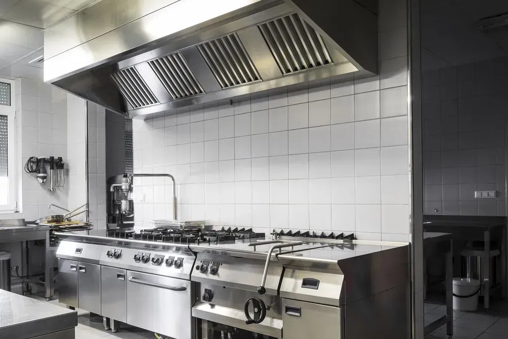 Stainless Steel Commercial Kitchen With Stove — Sheetmetal Improvements & Design in Molendinar, QLD