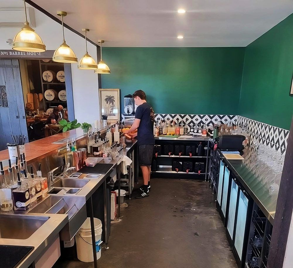 Interior of a Bar With a Person Preparing — Sheetmetal Improvements & Design in Burleigh Heads, QLD