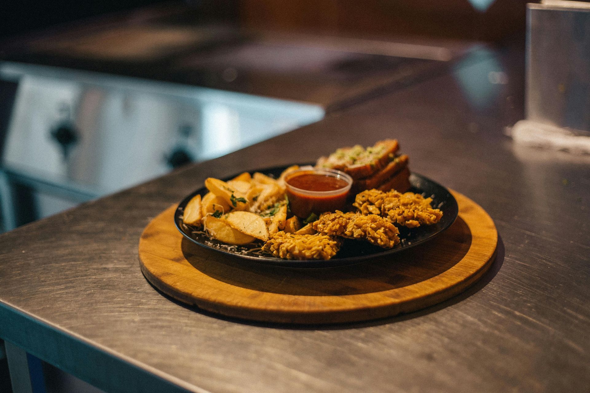 Plate of Fried Food With Dipping Sauce — Sheetmetal Improvements & Design in Burleigh Heads, QLD