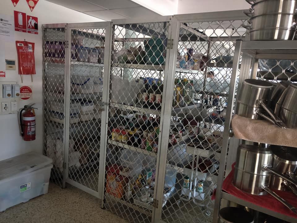 Metal Storage Cabinets Filled With Food Items In A Kitchen Setting — Sheetmetal Improvements & Design in Burleigh Heads, QLD