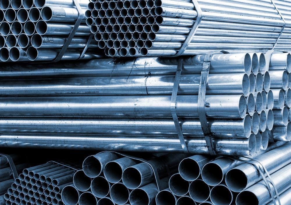 Bundles of Metal Pipes, Tightly Stacked and Secured — Sheetmetal Improvements & Design in Burleigh Heads, QLD