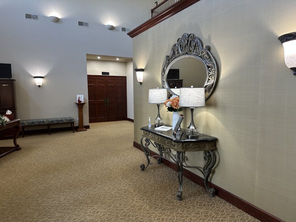 Several photos of interior and exterior photos of Stemm Lawson Peterson Funeral Home and Cremation Center in Elkhart, IN.