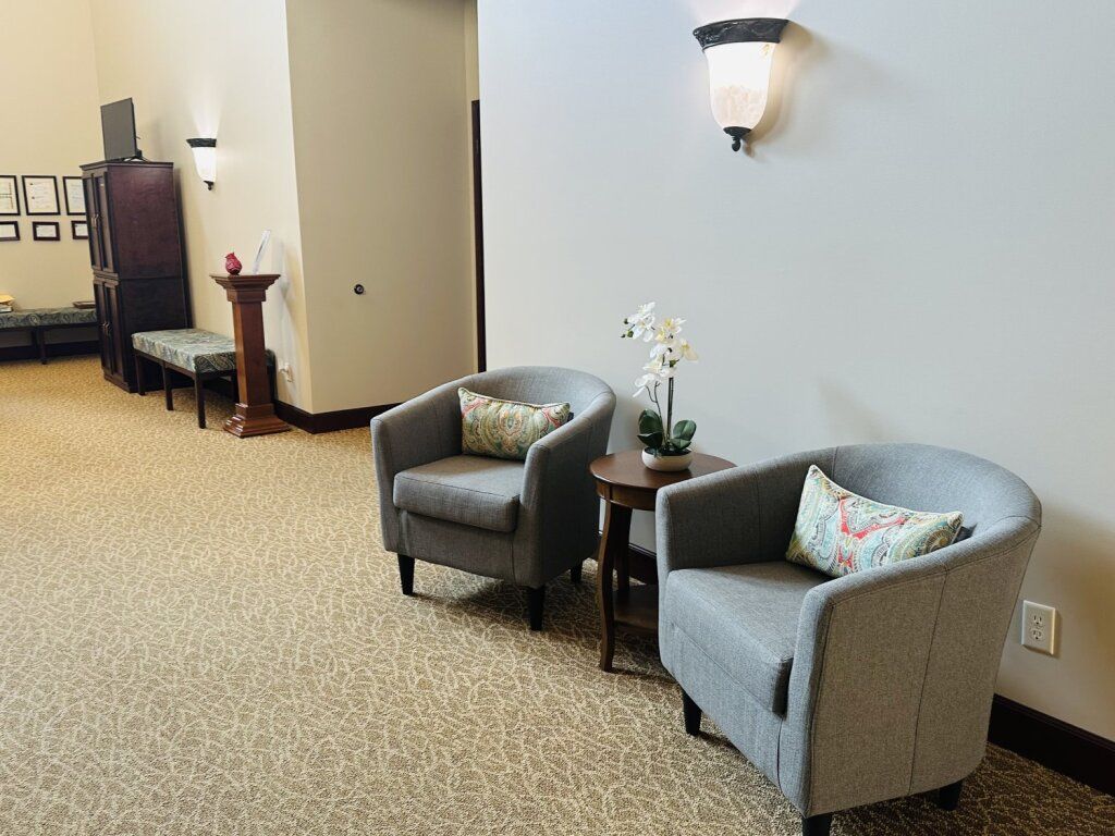 Several photos of interior and exterior photos of Stemm Lawson Peterson Funeral Home and Cremation Center in Elkhart, IN.