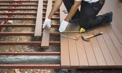 Man Building a Deck — Home Restoration in Kinston, NC