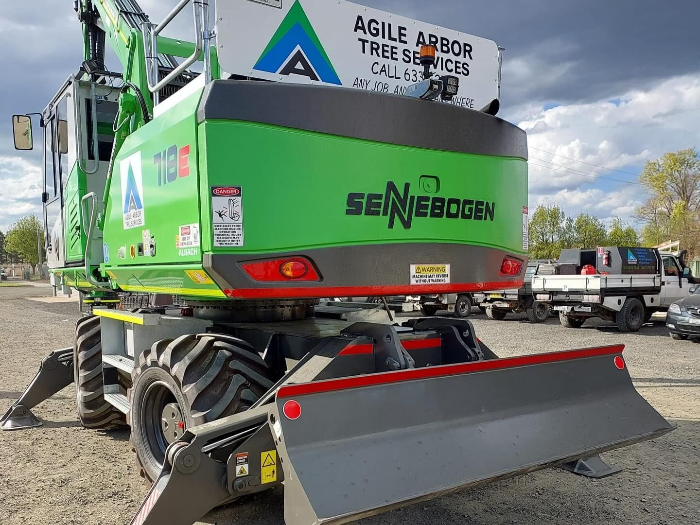 Green and Black Sennebogen 726 Tree Removal Machine With Blade — Agile Arbor Pty Limited in Blayney, NSW