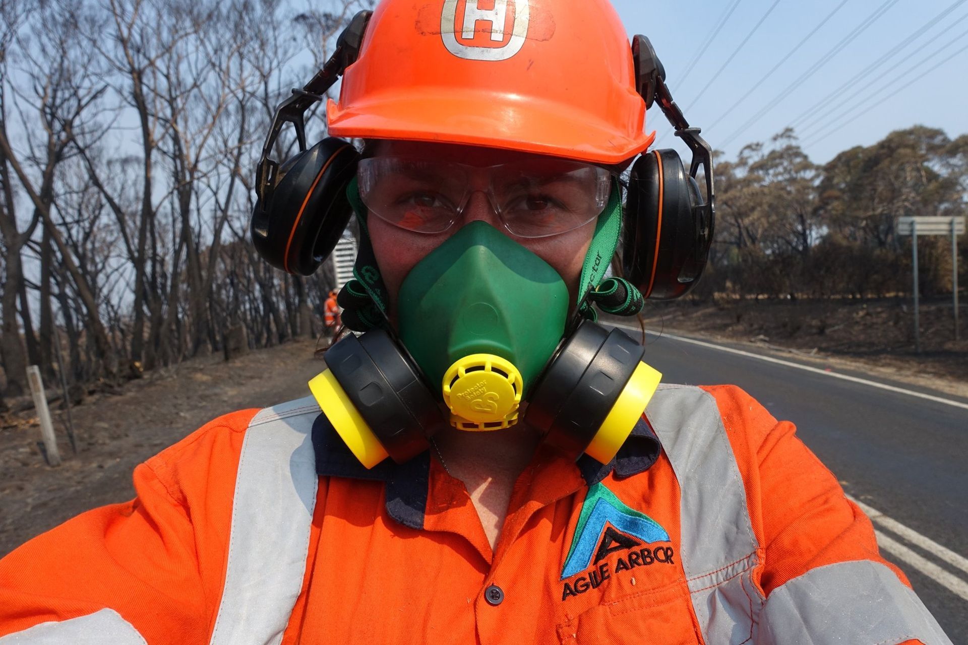 Person in Safety Gear, Including Respirator and Hard Hat — Agile Arbor Pty Limited in Kelso, NSW