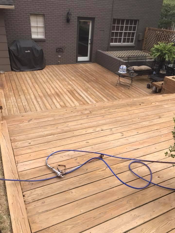 Wooden deck with hose on the floor — Morrilton, AR — Chadek Power Wash