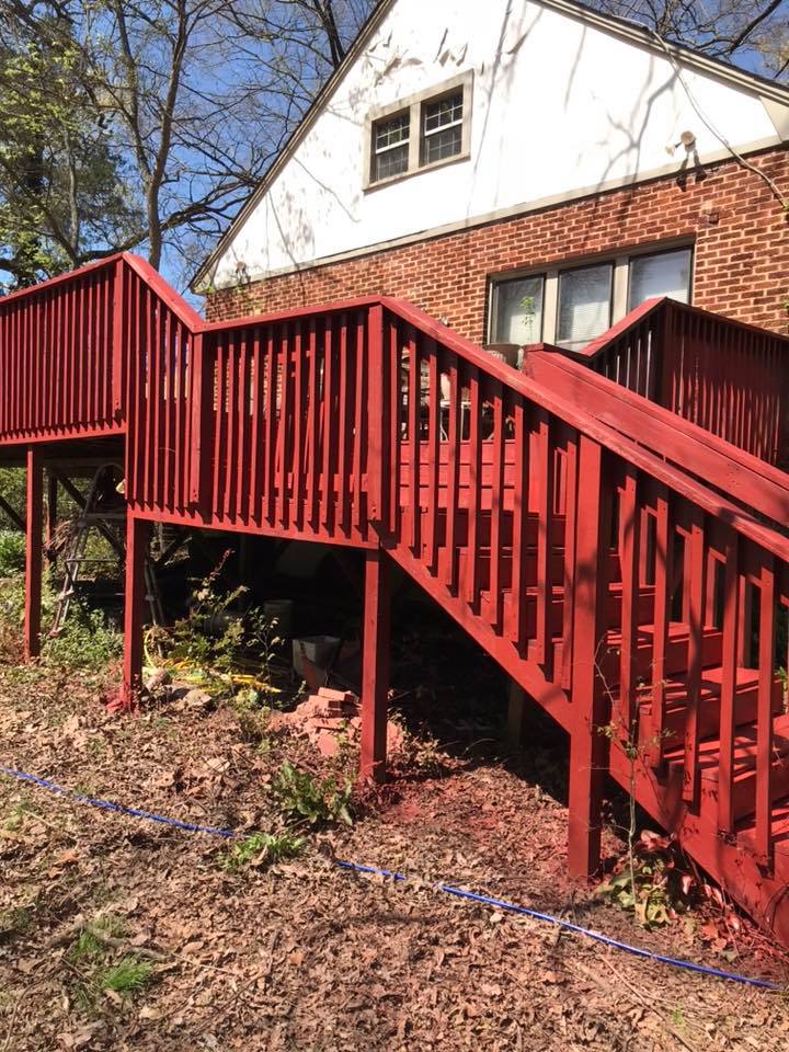 Red deck in front of a house — Morrilton, AR — Chadek Power Wash