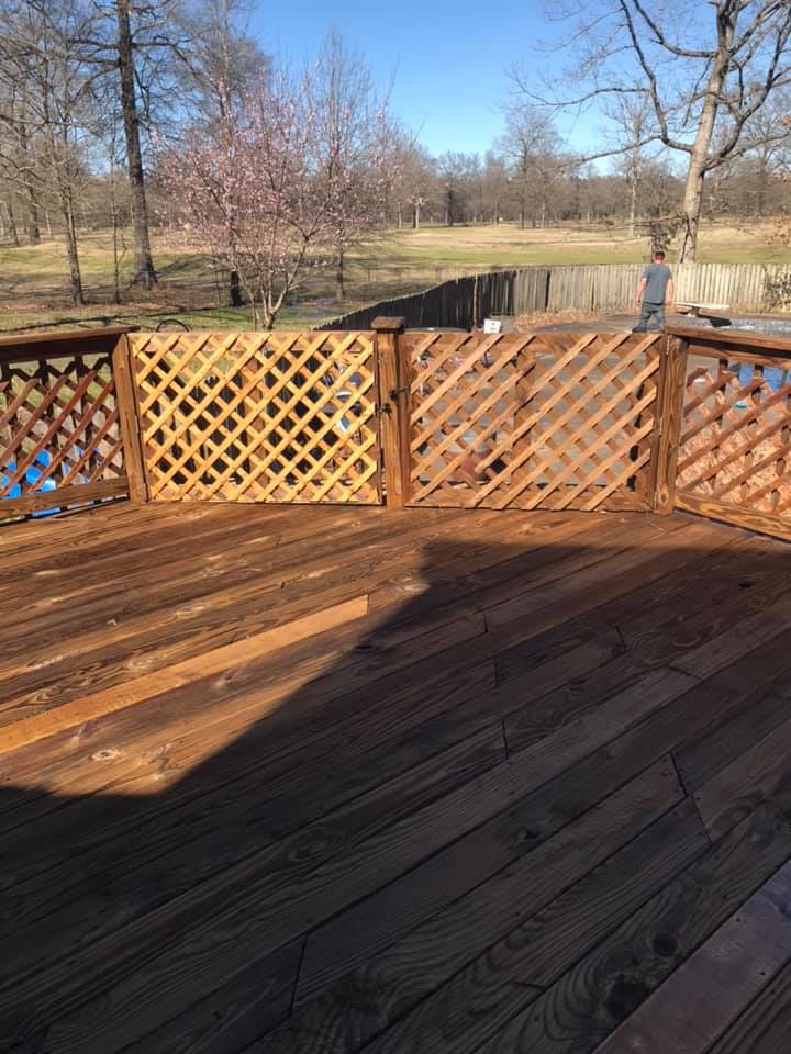 Wooden deck with many trees with no leaves in front — Morrilton, AR — Chadek Power Wash