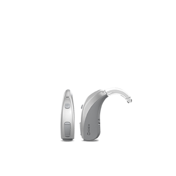 A pair of hearing aids on a white background.