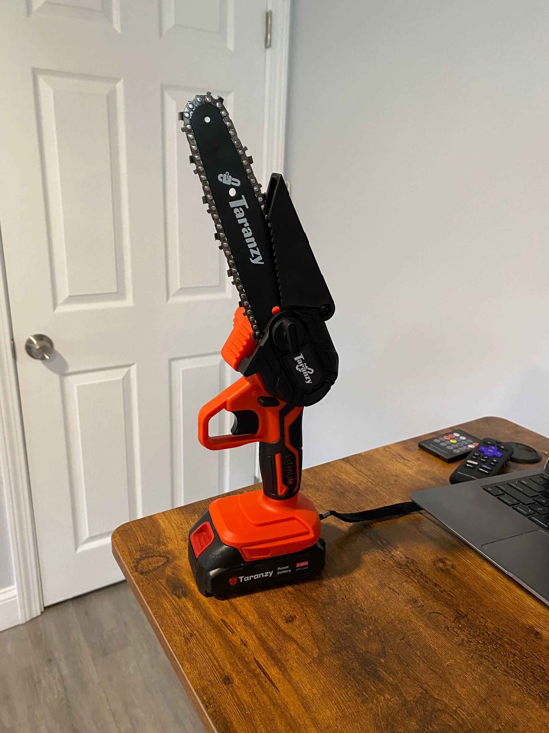 taranzy mini chainsaw on a desk