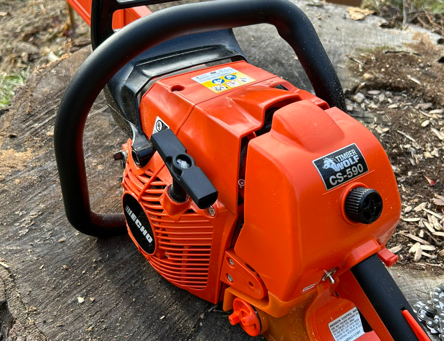 chainsaw sitting on a stump