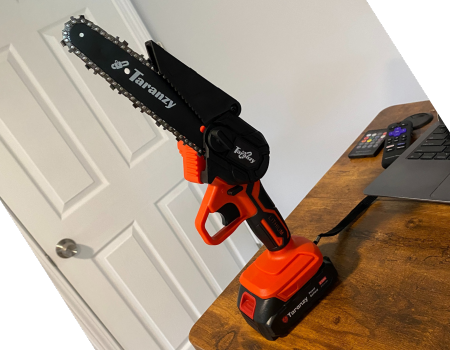 mini chainsaw on a table