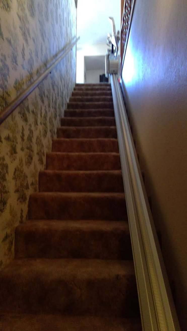 A set of stairs leading up to a second floor in a house.