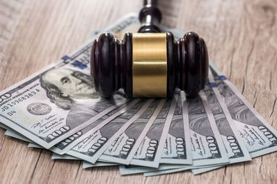Child Custody — Judge's Gavel with Dollars  in Jacksonville, NC
