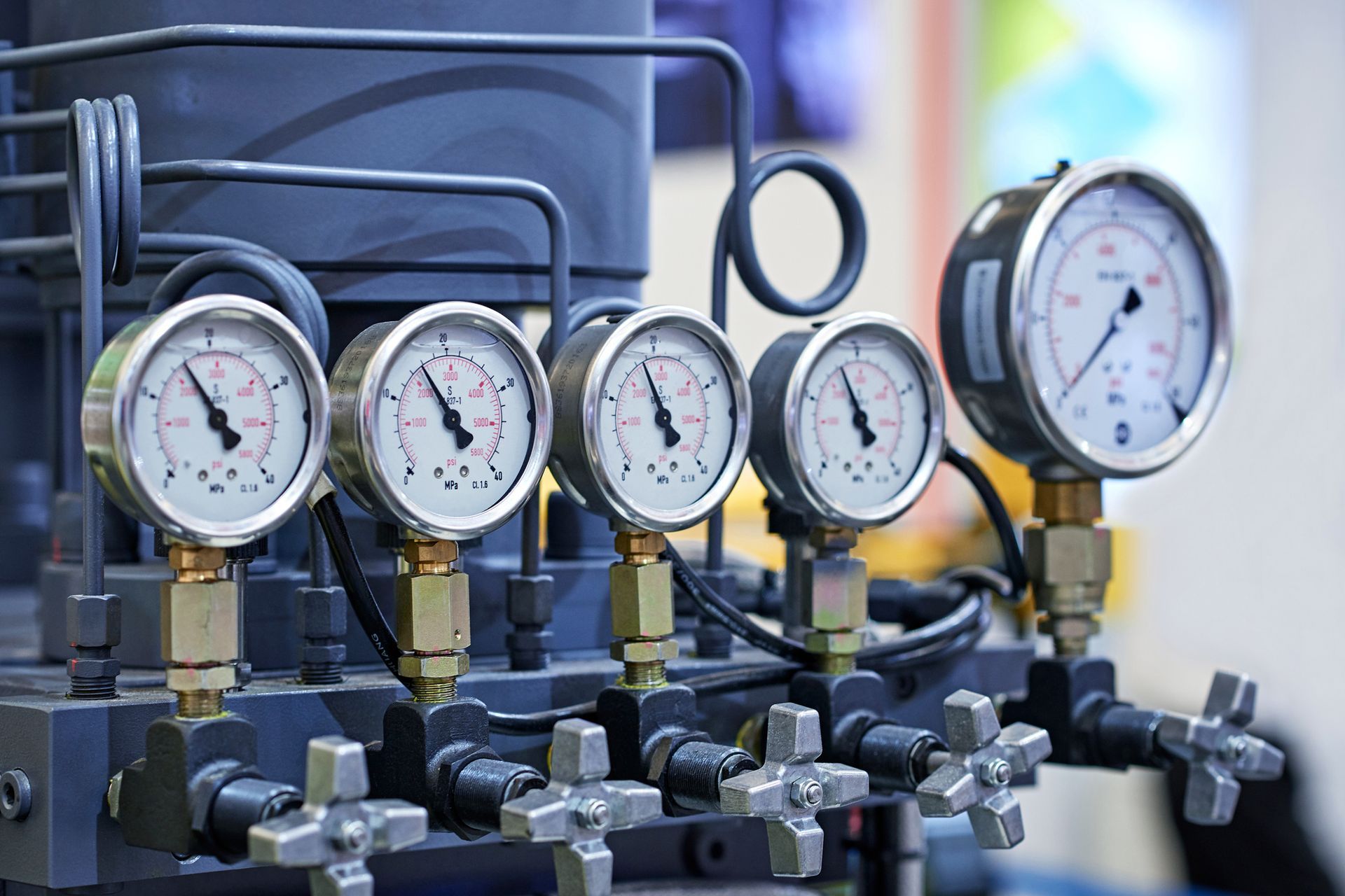A bunch of pressure gauges are sitting on top of a machine - Houston, TX - Ramsey & Company Manufacturer’s Representatives