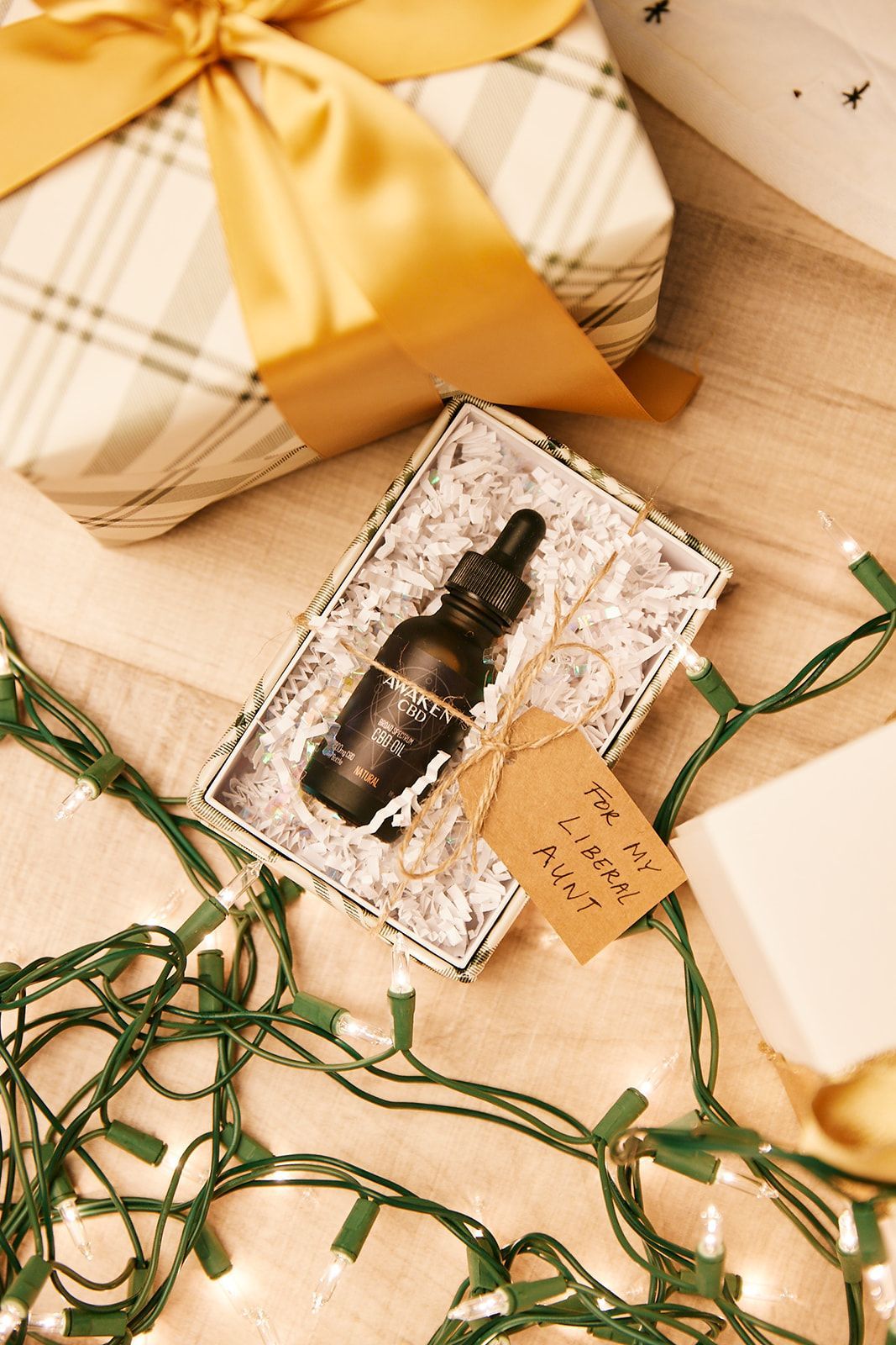 Awaken CBD Tincture in a gift wrap