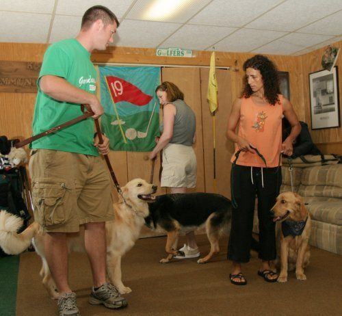 A man in a green shirt has the number 19 on his shirt