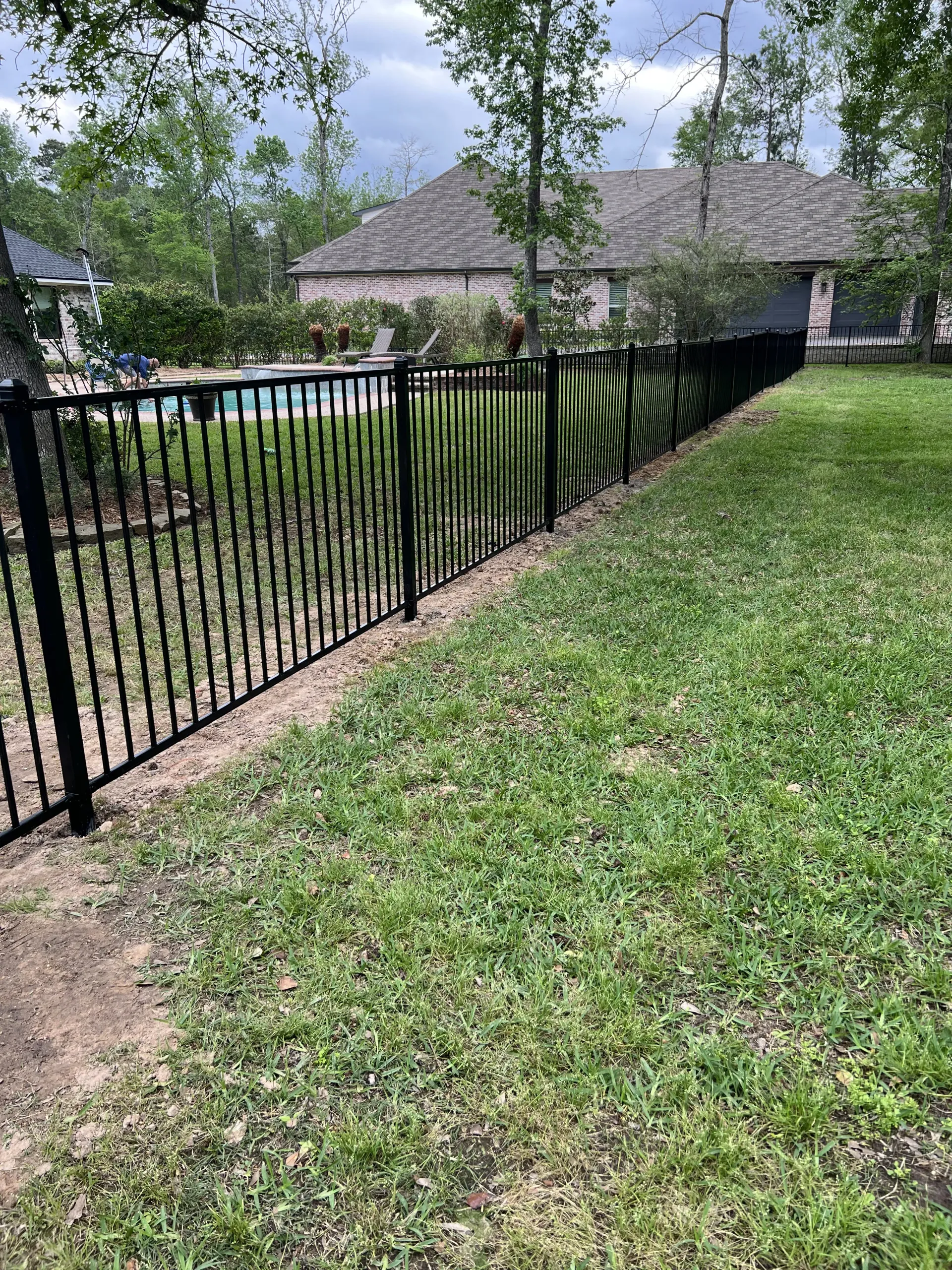 Ornamental iron fence installed by Ark Fence