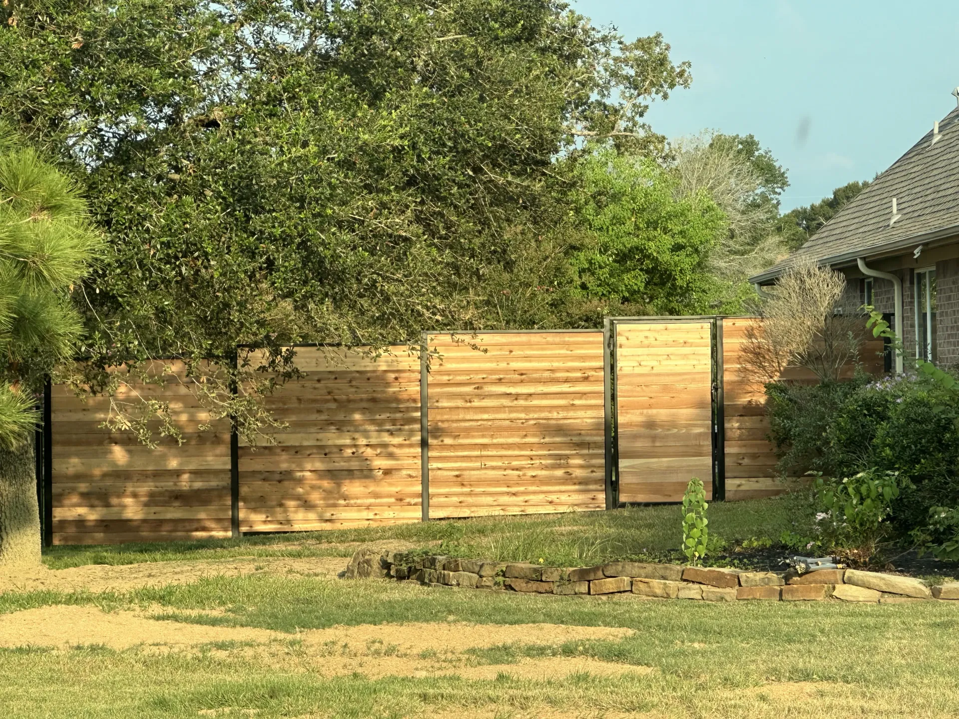 Backyard fence installed in Magnolia TX by Ark Fence